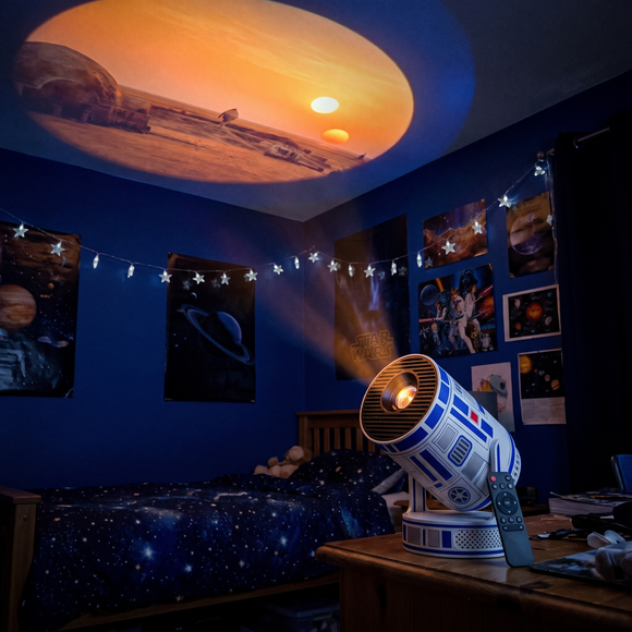 AstroCast projecting a twin-sun planet on a bedroom ceiling